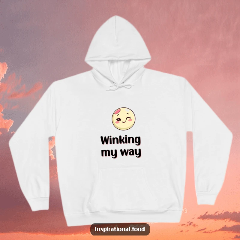 Funny macaron character hoodie, winking with a sweet smile, surrounded by colorful swirling patterns, offering cozy and humorous comfort.