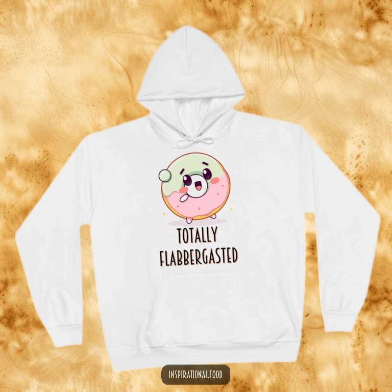 Funny hoodie with a cheerful donut character with a surprised expression, bouncing a ball with delight.