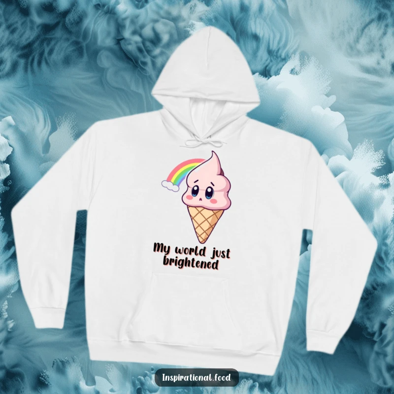 Funny Ice Cream Hoodie depicting a surprised ice cream cone character mesmerized by a vibrant rainbow, blending warmth and whimsy.