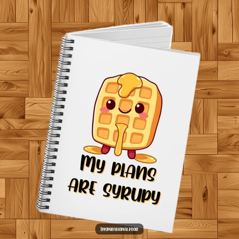 Funny notebook with a smiling waffle character and syrup drips, ideal for jotting down sweet ideas.